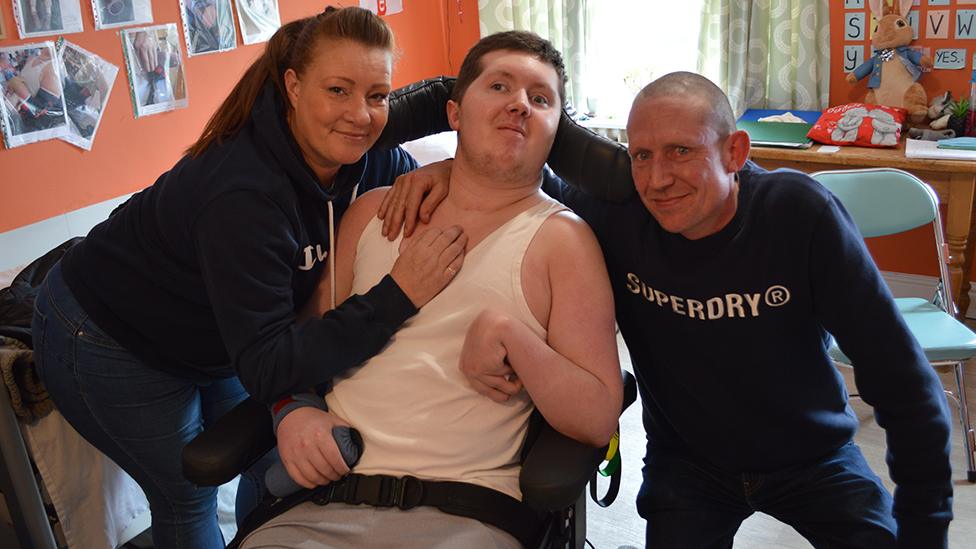 Luke Goold-Hannatt with his parents