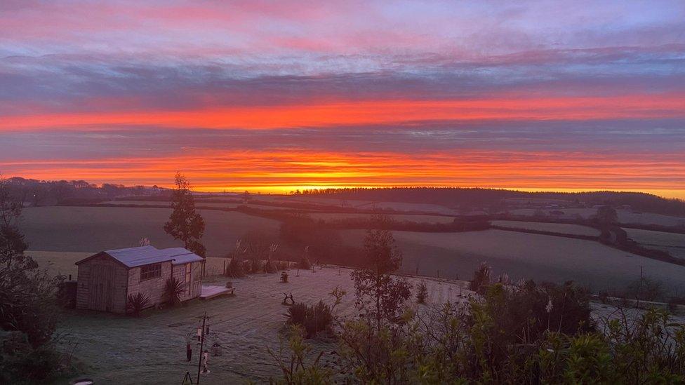 The stunning sunrise over West Buckland in Devon