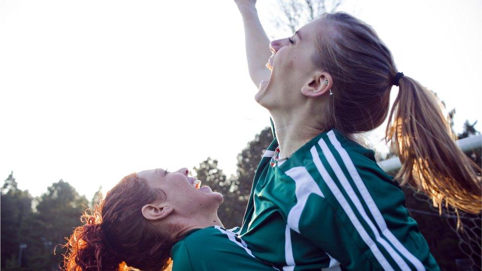 Girls cheering