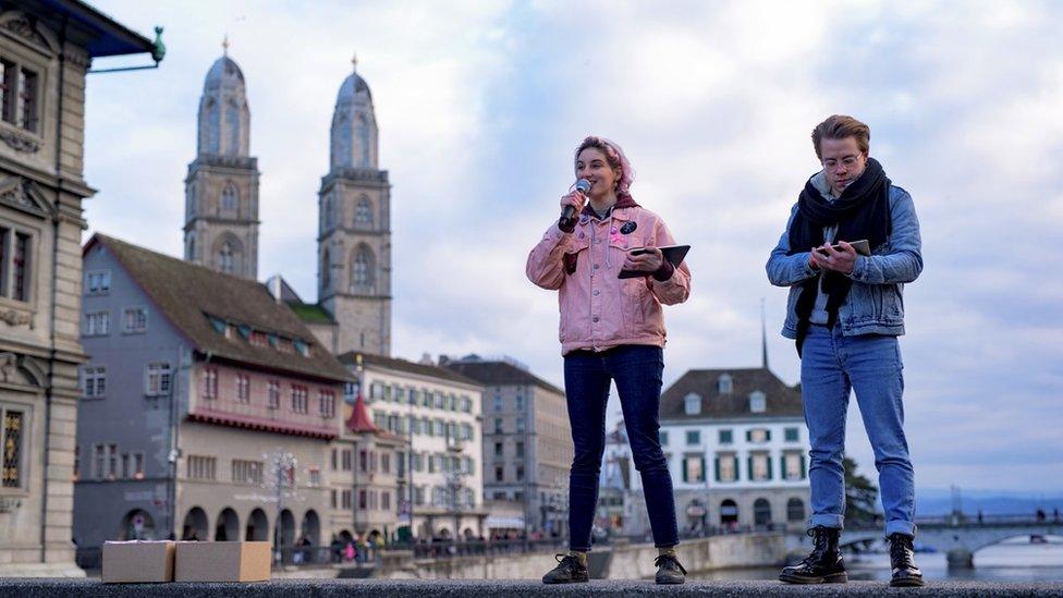 Anna Rosenwasser, left, speaking at an event