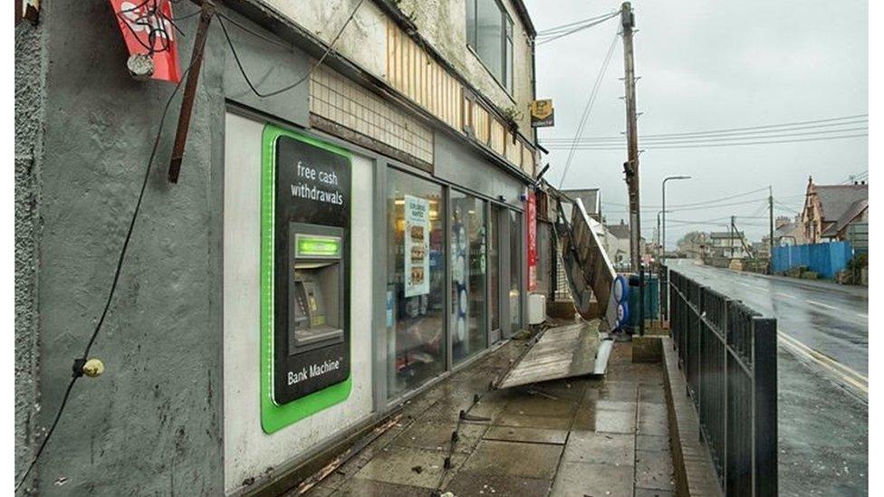 Shop front damaged at Valley on Anglesey