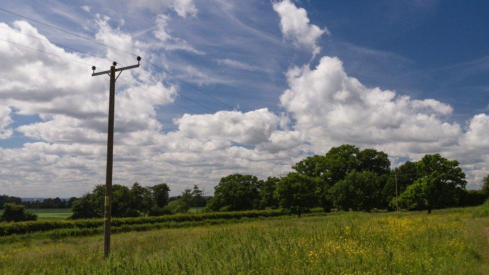 A telegraph pole in a rural area