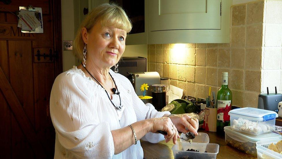 Suzy Rose with leftovers in her kitchen