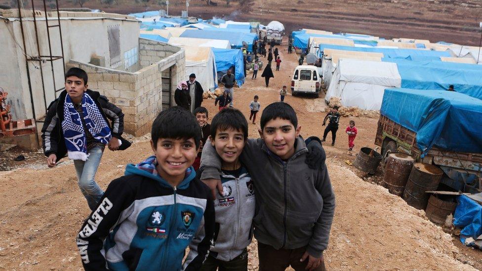 Syrian children evacuated from Aleppo at a refugee camp near Idlib, Syria (16 December 2016)