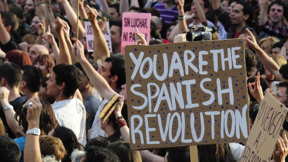 Protesters gather at Puerta del Sol square in Madrid on May 21, 2011 during a protest against Spain's economic crisis and its sky-high jobless rate