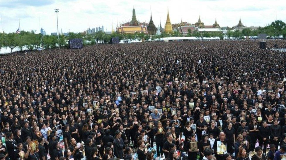 Mourners gather in front of the royal palace in Bangkok. Photo: 22 October 2016