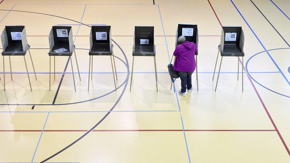 Lone woman in gym votes in North Carolina