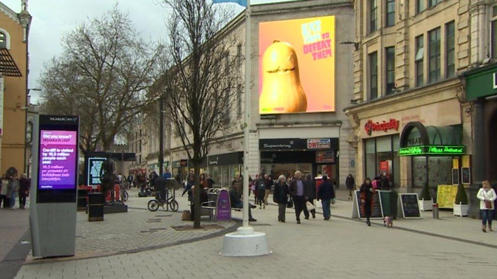 Digital adverts on Queen Street, Cardiff