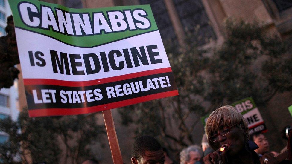 A banner saying "Cannabis is medicine - Let states regulate"