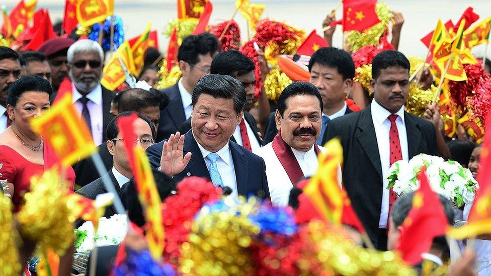 China's President Xi Jinping and Sri Lankan President Mahinda Rajapakse at Bandaranaike International Airport, Sri Lanka, on 16 September 2014