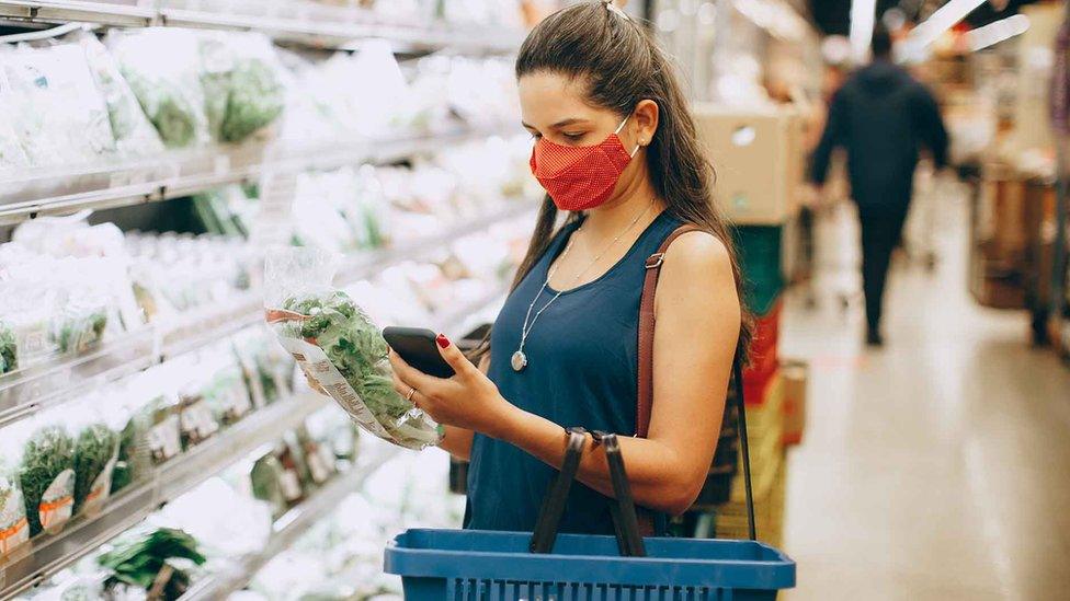 Woman shopping in a supermarket