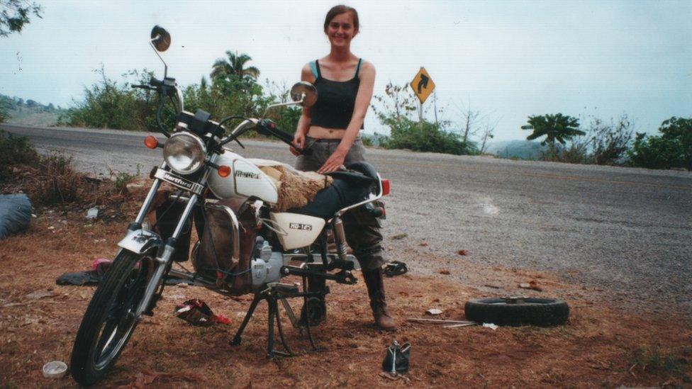 Ida Tin fixing her motorbike in Mexico