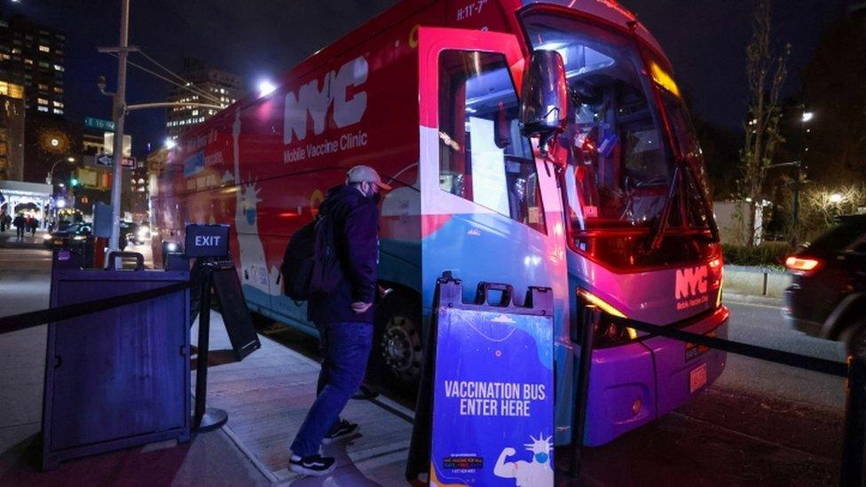 Man enters mobile vaccination clinic in Manhattan, New York