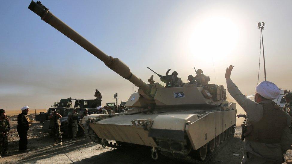 Iraqi soldiers advancing on the city of Mosul.