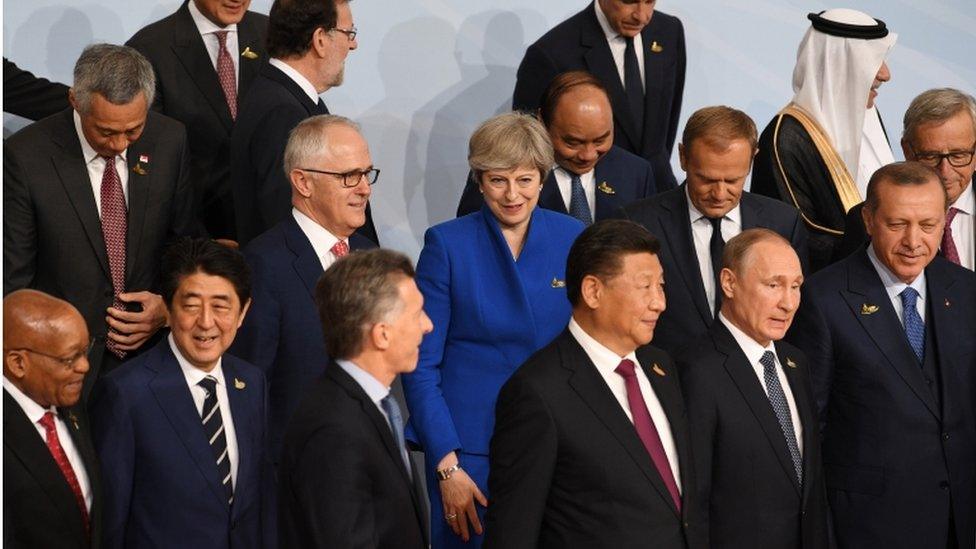 Theresa May and other leaders at the G20