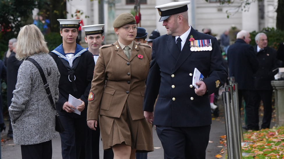 A mix of armed services personnel