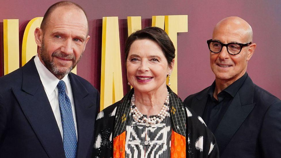 Ralph Fiennes, Isabella Rossellini and Stanley Tucci attend the BFI London Film Festival gala screening of Conclave, at the Royal Festival Hall, Southbank Centre in London