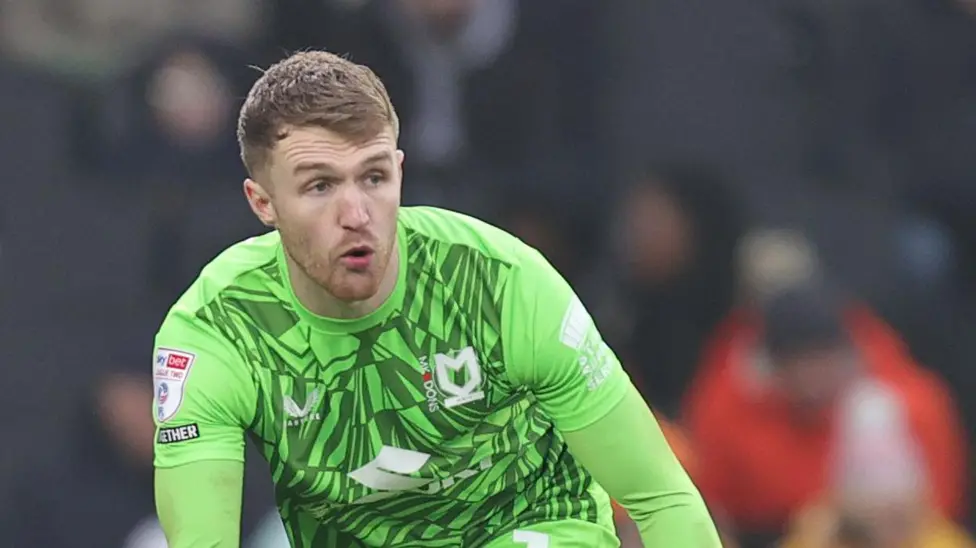 MK Dons goalkeeper Connal Trueman signs a new deal with the club