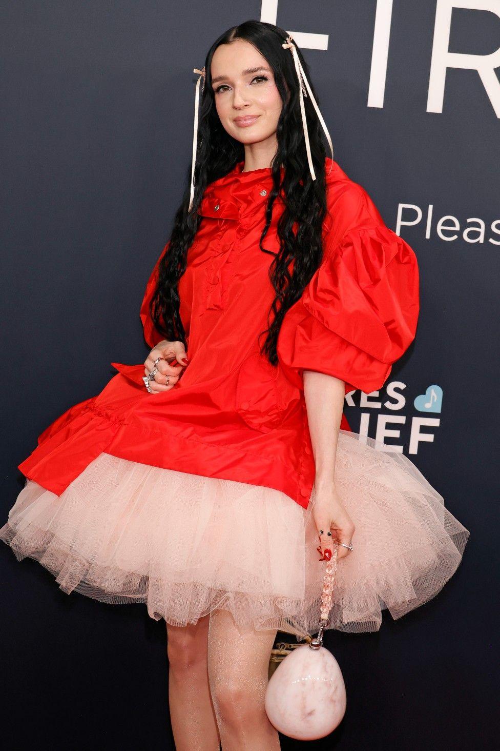 Poppy posing on the red carpet at the Grammys