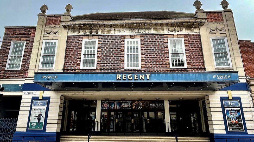 A image show from a low level looking up at the entrance to the Ipswich Regent Theatre entrance