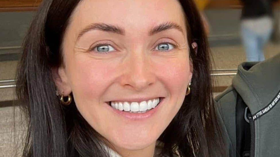 Close up of Grace McCarrick, who has long dark hair and blue eyes