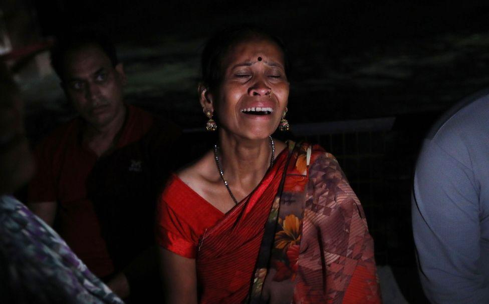 Family members of stampede victims mourn outside a hospital in Hathras, Uttar Pradesh, India, 02 July 2024