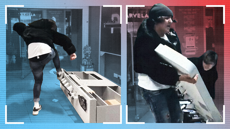 Composite treated image showing two stills from a CCTV video. In the first, the back of someone is seen as they kick a display of dummy iPhones in a shop; in the second, two young men are picking up the damaged display prior to walking out of the shop with it.