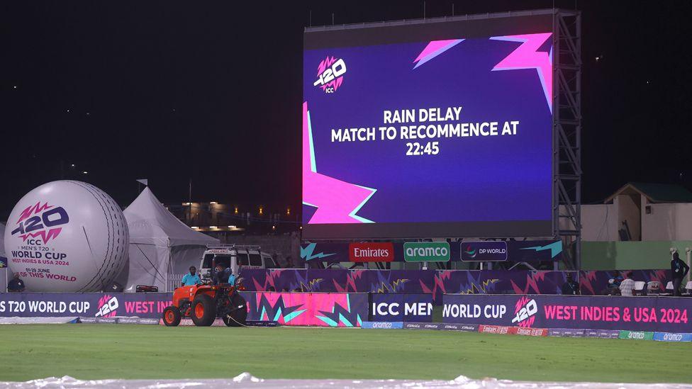 Scoreboard reading "rain delay match to recommence at 22:45" during the Afghanistan v Bangladesh match at the T20 Cricket World Cup 