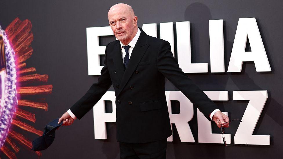 French film director Jacques Audiard poses on the red carpet upon arrival to attend the Gala screening of "Emilia Perez" at the Royal Festival Hall, during the 2024 BFI London Film Festival in London, on October 11, 2024