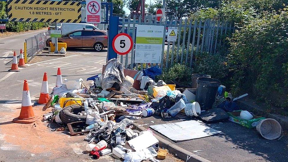 Fly tipped waste outside the entrance to Little Stoke Sort It recycling centre