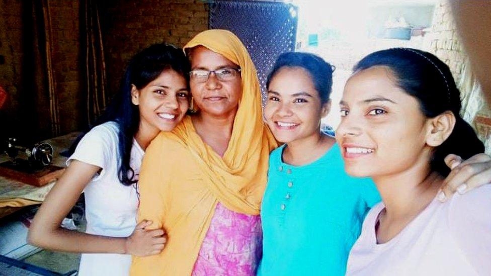 Nodeep Kaur with her mother and sisters