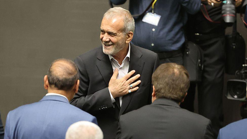 Iranian President-elect Masoud Pezeshkian arrives before swearing-in ceremony as new president at the Iranian parliament in Tehran, Iran, 30 July 2024.