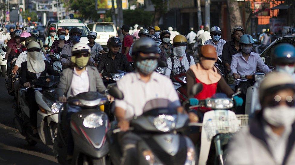 General view of commuters travelling on Scooters and motorbikes in Ho Chi Minh City, Vietnam