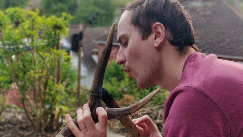 Jake Rowland carving axes out of antlers