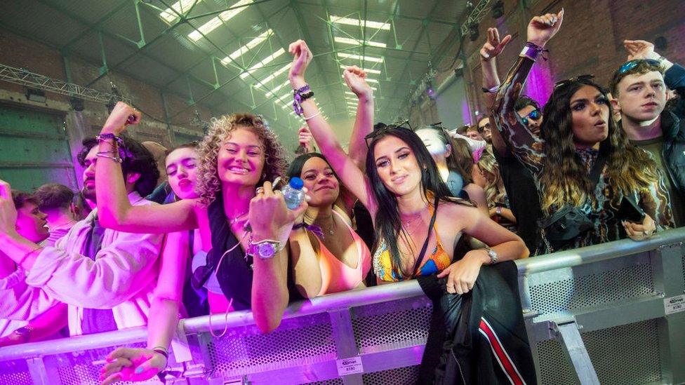 Clubbers dancing at the trial in a warehouse in Liverpool