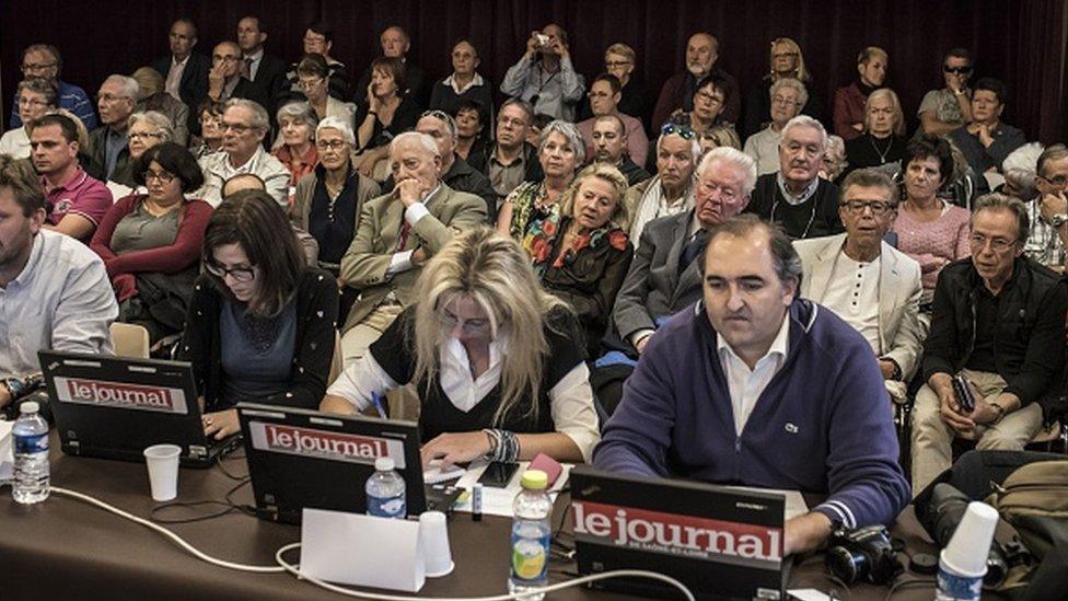 Members of the public and journalists watch as councillors attend a City Council meeting on the end of the pork alternative menu in schools in September 2015 in Chalon-sur-Saone