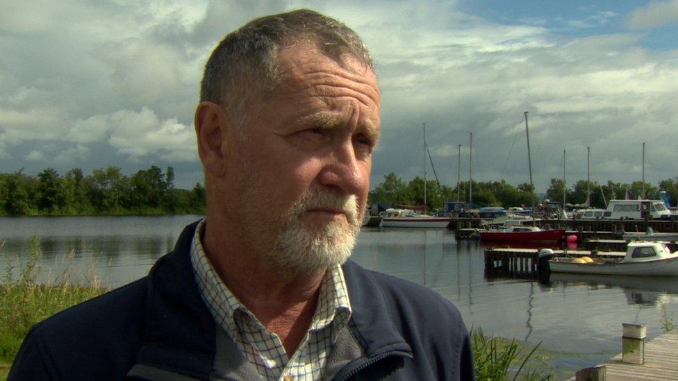 Farmer Michael Meharg standing at the pier of Lough Neagh