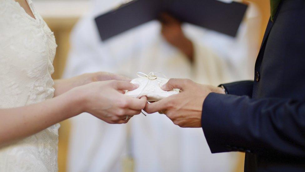 A couple at their wedding