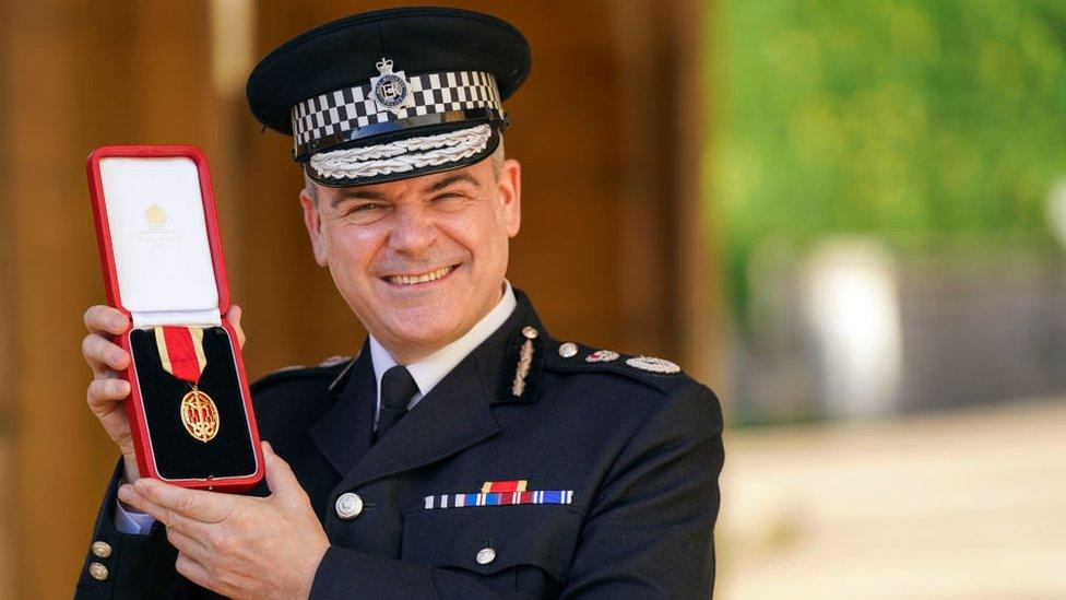 Sir David Thompson, poses after being made a Knight Bachelor by the Prince of Wales during an investiture ceremony at Windsor Castle on February 1, 2022