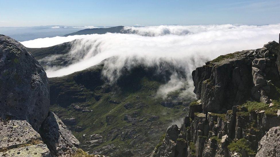 View of inverted clouds taken from Tryfan looking towards the Glyderau peaks