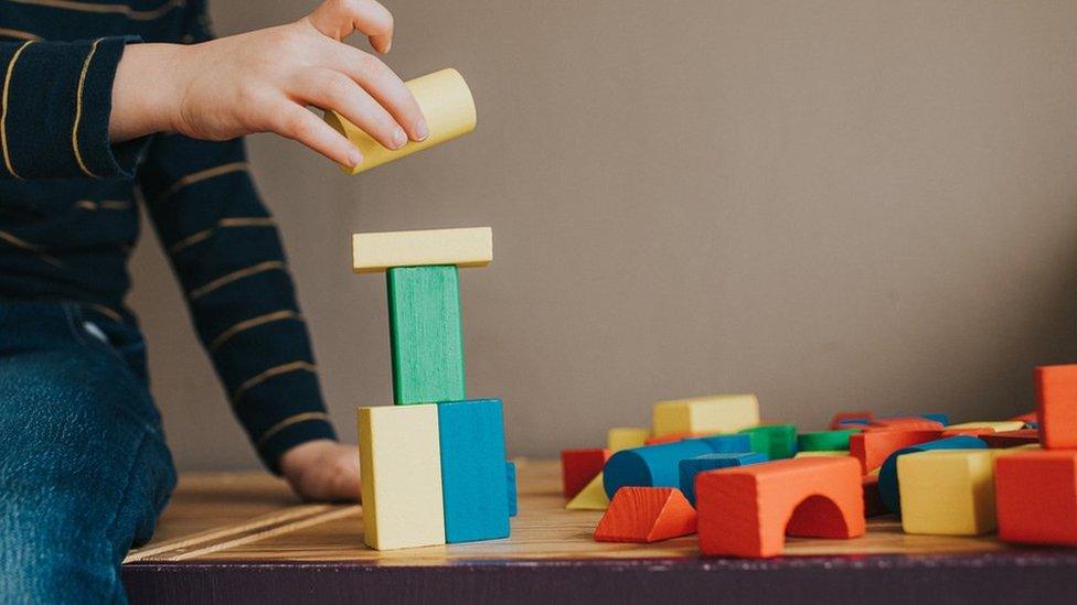 Child playing with blocks