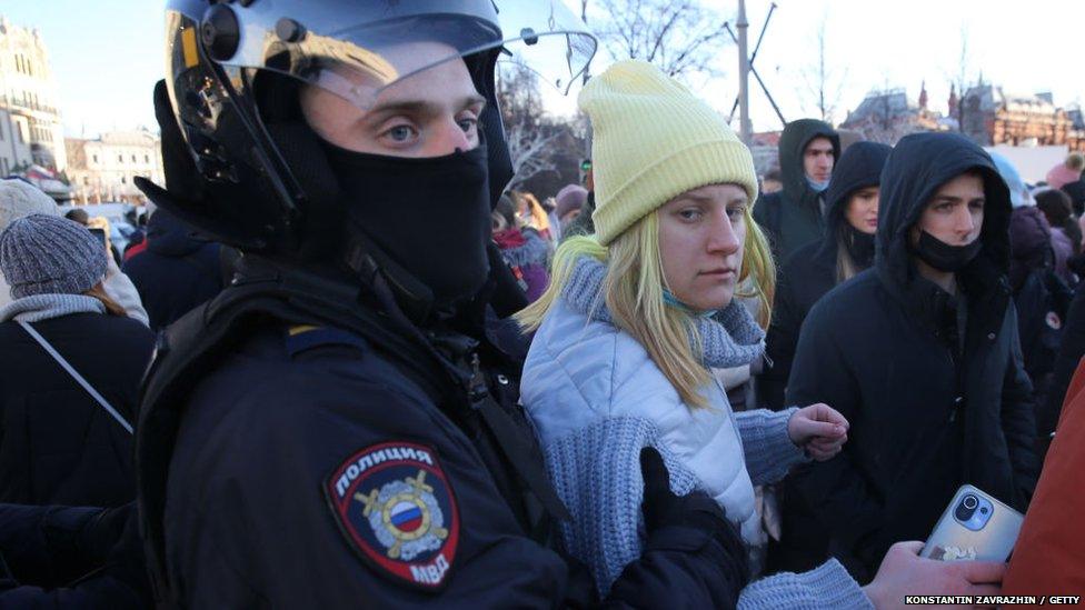 Police detain woman in russia