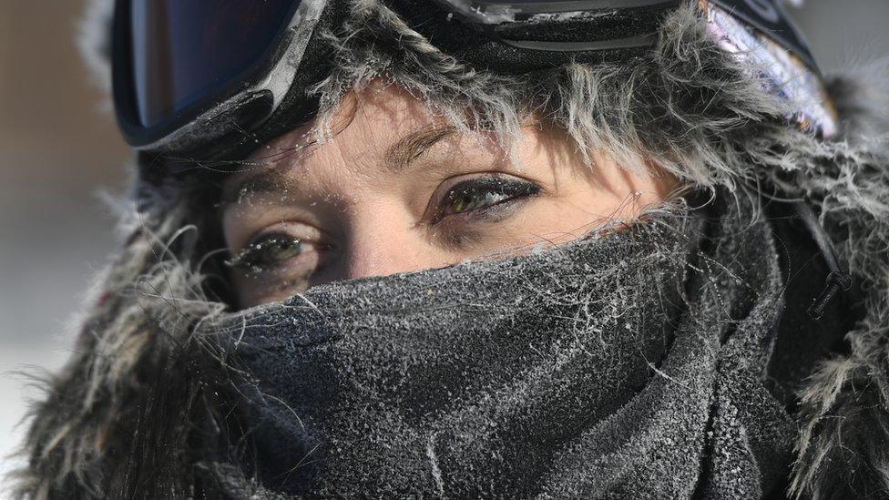 A woman in Minneapolis bundled up in ski gear