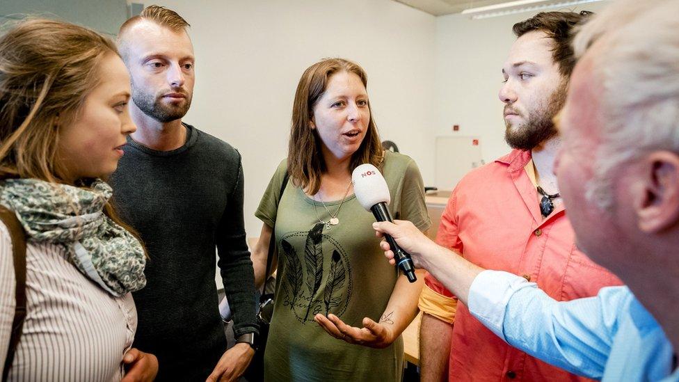 Donor children speak to press as they attend the court decision related to the case of late director of a fertility clinic Jan Karbaat, in Rotterdam