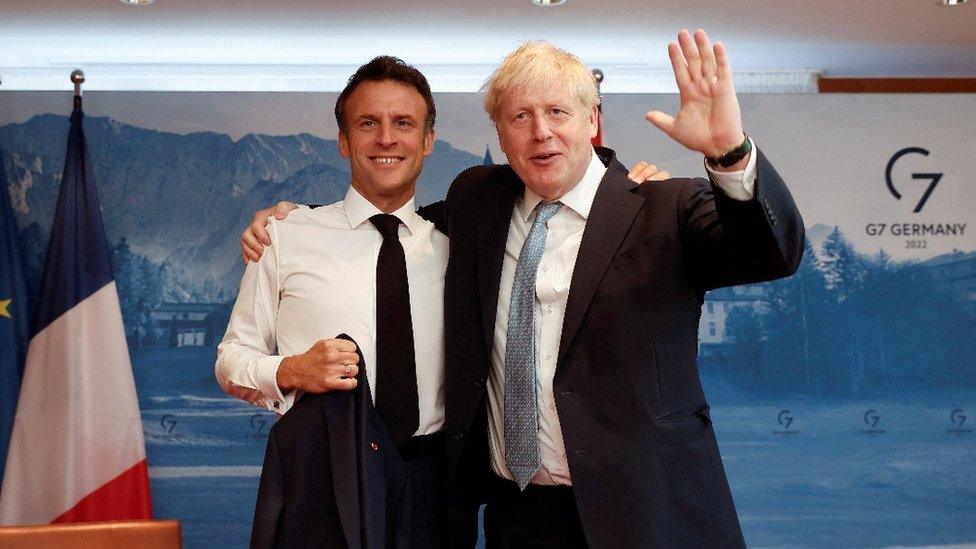 French President Emmanuel Macron and British Prime Minister Boris Johnson pose at a bilateral meeting on the day of a G7 leaders summit at Bavaria's Schloss Elmau castle, near Garmisch-Partenkirchen, Germany