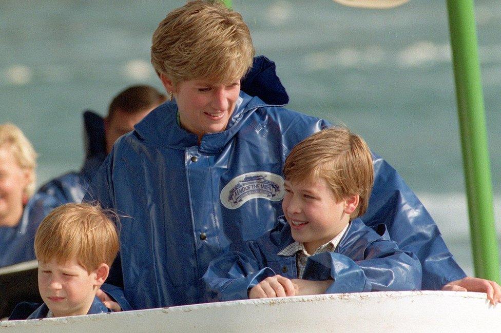 Diana, Princess of Wales, with her sons, Princes Harry (left) and William, aboard the Maid of the Mist cruiser near to Niagara Falls