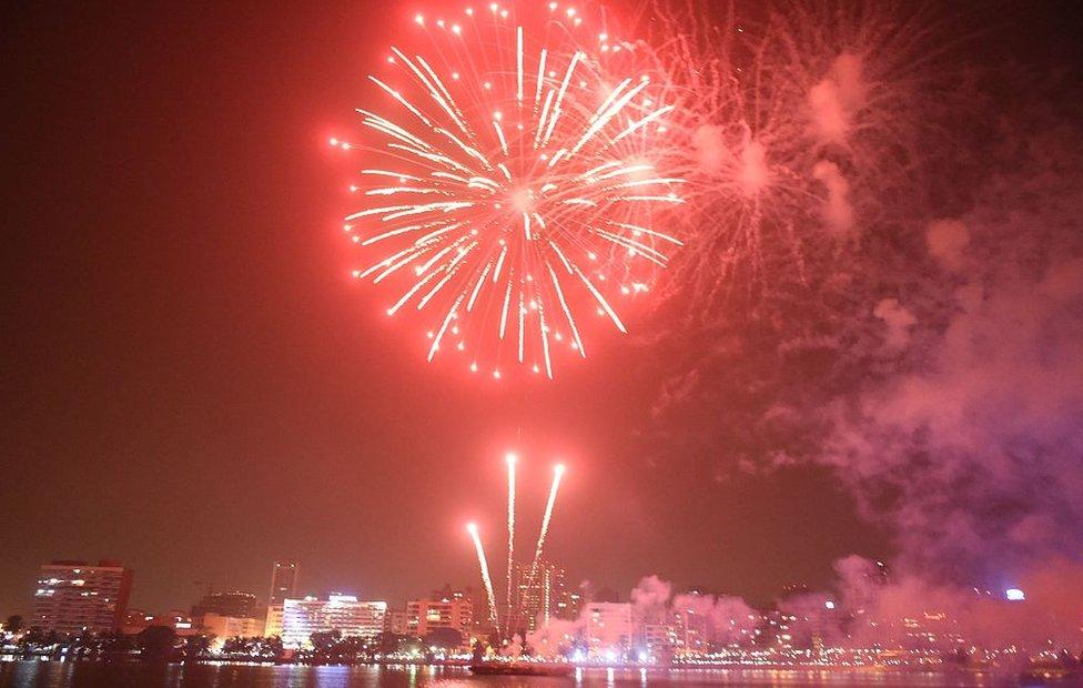 Fireworks light up the night skyline in Abidjan