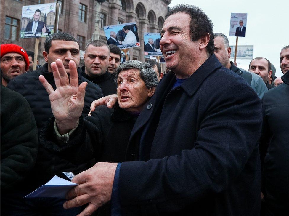 Armenian businessman Gagik Tsarukyan in a street in the city of Gyumri