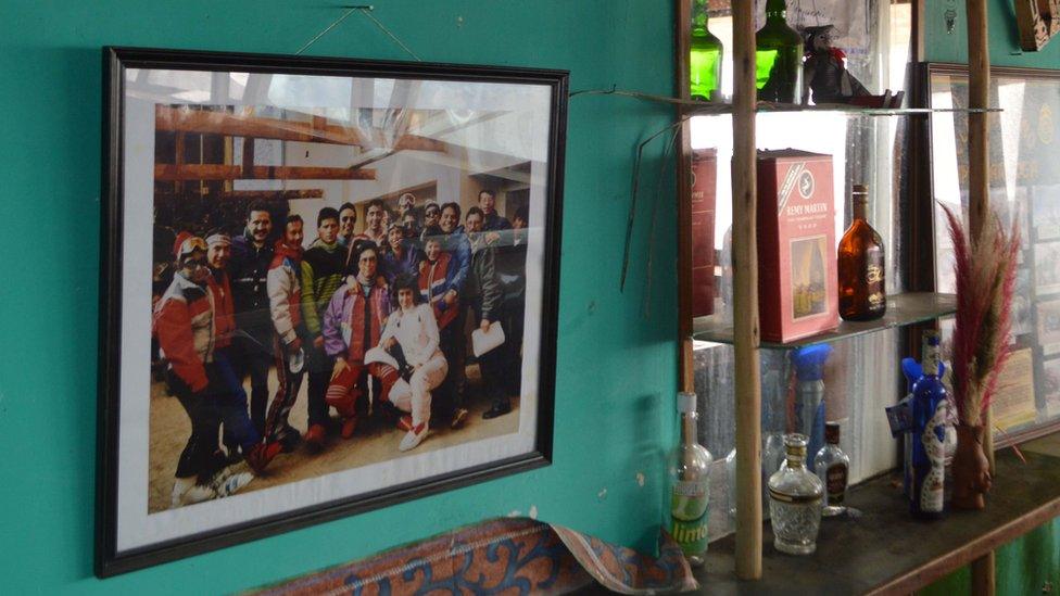 A photo of skiers hangs on the wall in the bar of the Chacaltaya ski resort