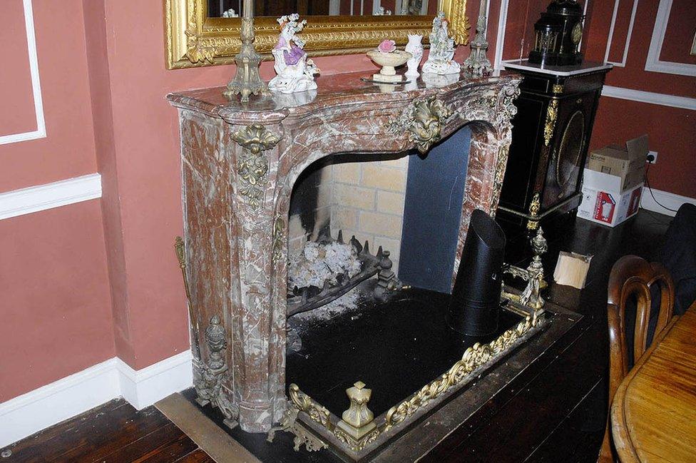 19th Century Rococo red marble fireplace worth £30,000.